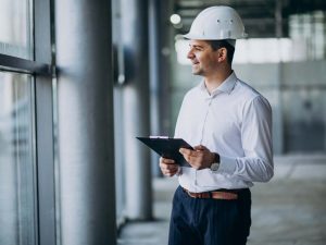 handsome-business-man-engineer-hard-hat-building-(1)